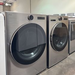LG Stackable Smart Front Load Washer And Vented Stackable Smart Electric Dryer In Graphite Steel 