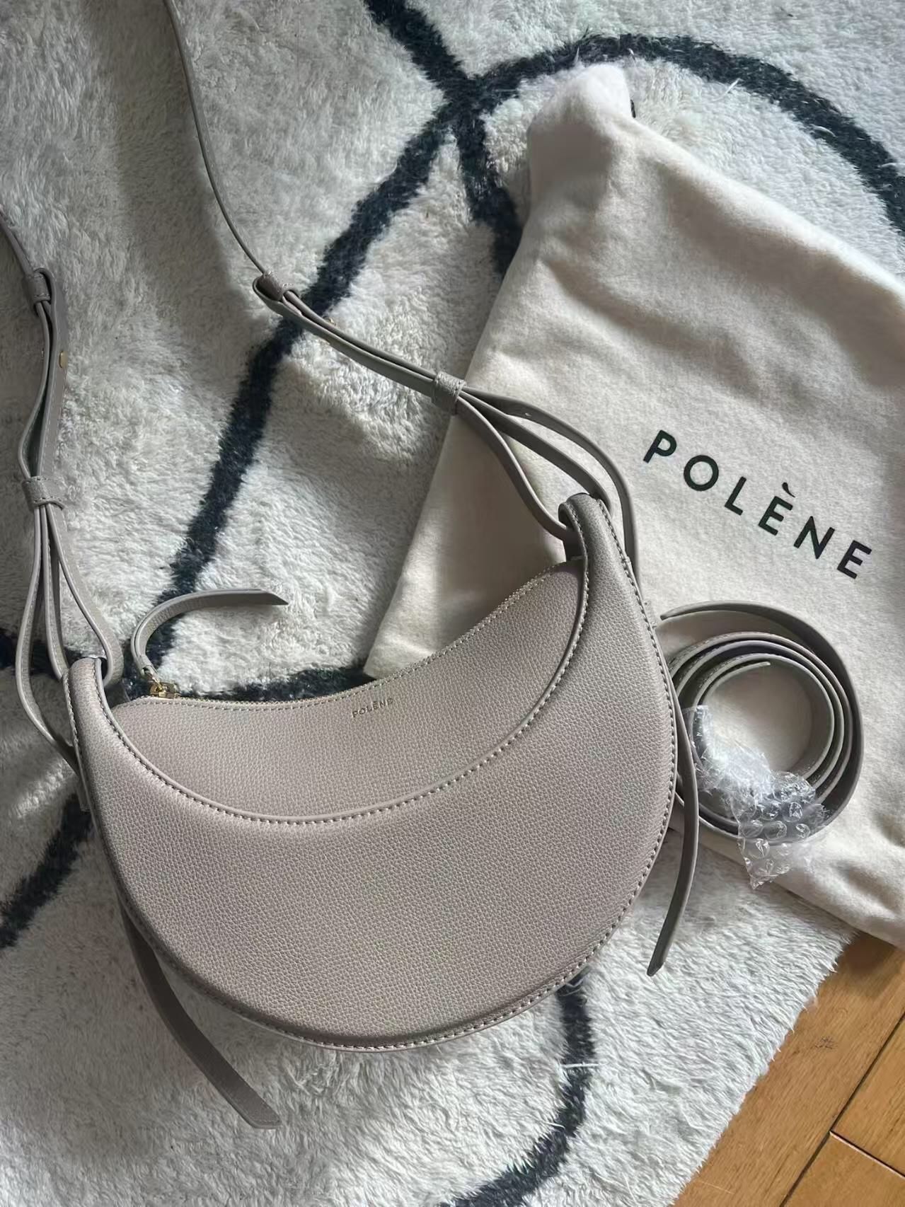 Shoulder straps: Comes with two adjustable shoulder straps (106cm and 138cm) Weight: Approximately 0.386kg Dimensions: 24cm (length) x 7.5cm (width) x