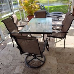 7 piece patio table with 6 chairs