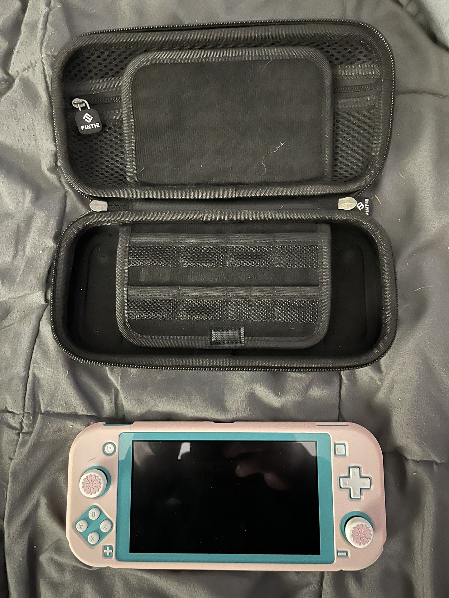 SWITCH LITE TEAL ( Great Condition, Pink Skin Covers)