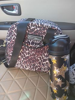 I have a brand new Betsey Johnson lunch bag that is leopard print and a matching leopard print star tumbler for sale