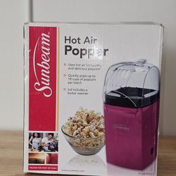 Pink Popcorn Popper thats been slightly used with no damages. 