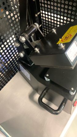 Digital heat press machine likely used for transferring designs onto smaller items like labels or clothing