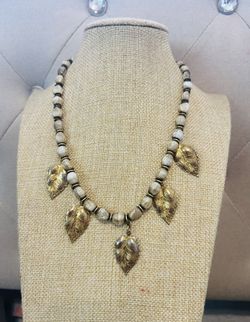 Necklace $15.00 High Gloss Seed Finish Leaf Motif