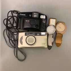 Two Cameras And Three Watches