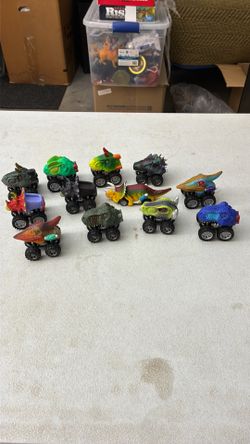 Lot of 12 hot wheel type dinosaur cars