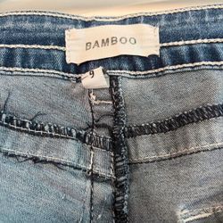 Low-rise blue bootcut jeans