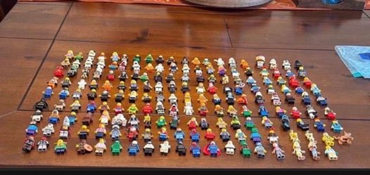 Large Lot of LEGO 180 Mini figures plus parts and accessories.