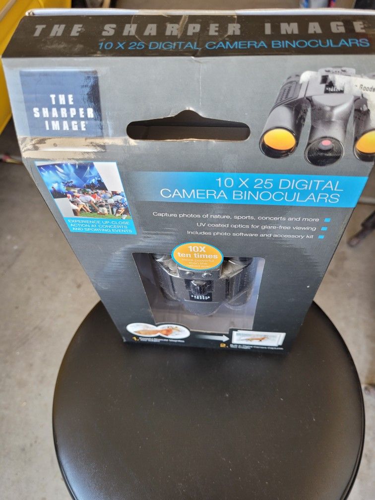 The Sharper Image 10 X 25 Digital Camera Binoculars.