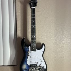 Electric Guitar With Skull Design 