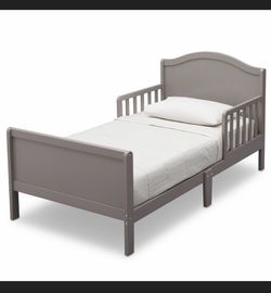 Gray kids bed with mattress