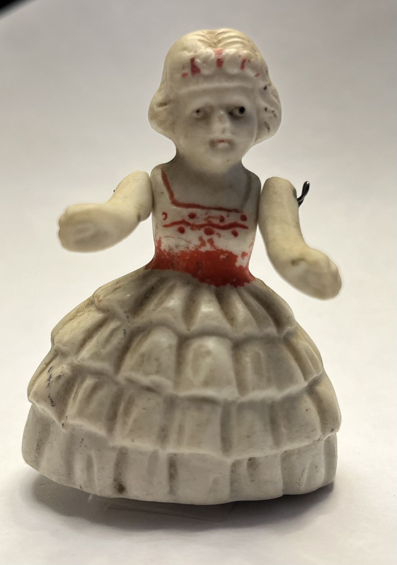 Antique Porcelain 2.5” X 1.75” Doll With Wire Attached Arms. Early 1900S.