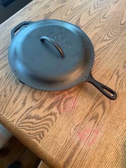 Two cooking cast-iron pans for camping, bbq or stove.