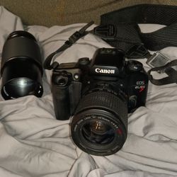 Canon Elan 7 Camera And Vivitar 75-205 Mm Lens