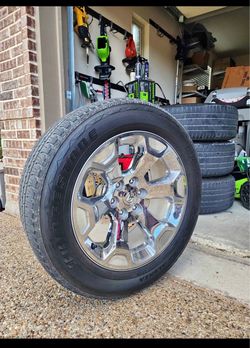 20” factory rims and tire