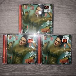 Taylor Swift The Life of a Showgirl CD + Hand Signed Photo