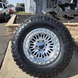 17" KMC rims w- 33" Ridgecrawler RT tires. $2000