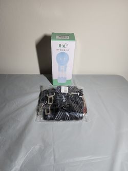 New Dog seat belt for car set, converts as a leash and new dog water bottle with snack compartment, $25 for both Or Best Offer 