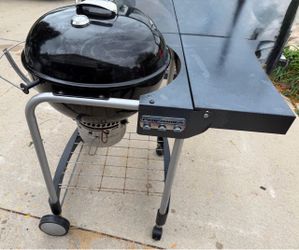 Webber performer charcoal grill station