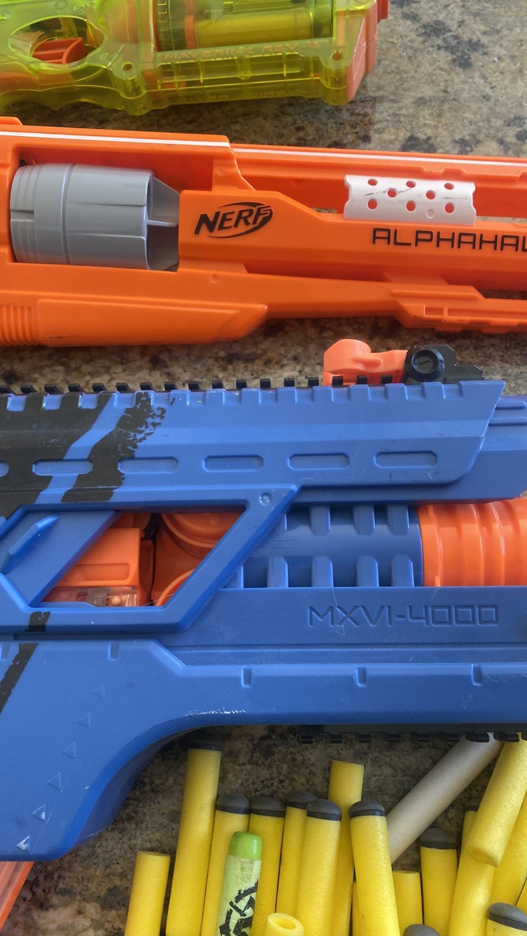 Various Nerf Guns With Bullets