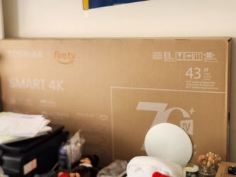 Brand new still in boxes, 2 smart tv