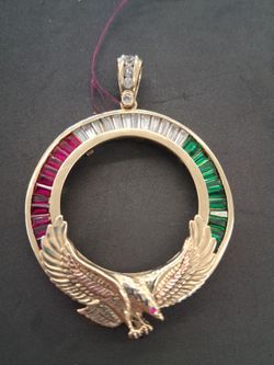 14k, 27.4g, yellow gold pendant