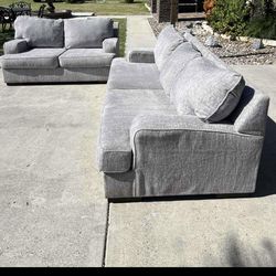 Beautiful wide and big grey two piece sofa set super soft and comfy asking 600