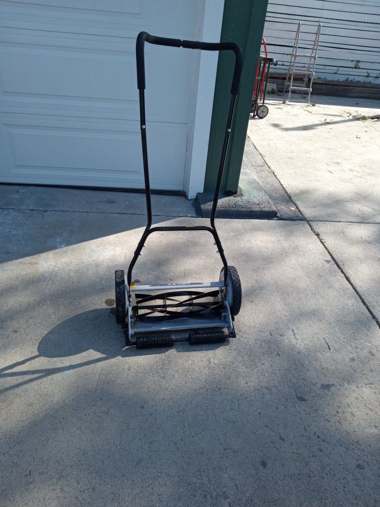 A Push Lawn Mower And Good Condition And Next