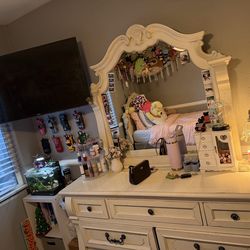 Twin size bed with trundle, dresser with mirror