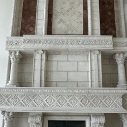 Luxurious Hand-Carved Stone Fireplace Mantel – Classic European Design