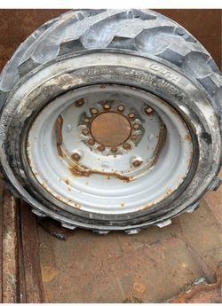 OTR Rim Guard Solid Skid Steer Tire on Wheel