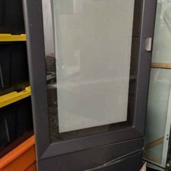 2 black cabinets wooden w/ glass