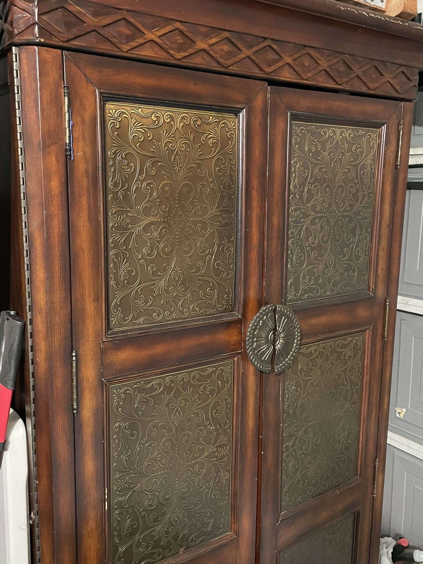 Fancy carved copper type armoire cabinet almirah
