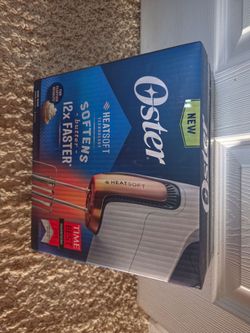 Brand new Oster 270-Watt Hand Mixer with HeatSoft Technology