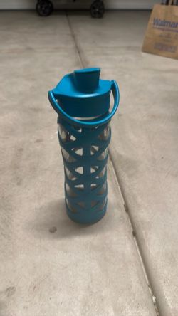 Glass Water Bottle with Teal Silicone Sleeve