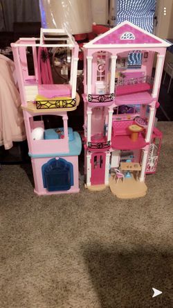 Dream house comes with lots of dolls, furniture and clothings