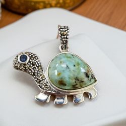 Cute Terquoise Turtle With Blue Saphire Eye Pendant Set In Sterling Silver