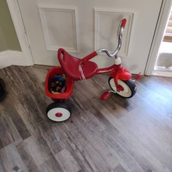 Radio Flyer Trike With Toys In The Back In Margate