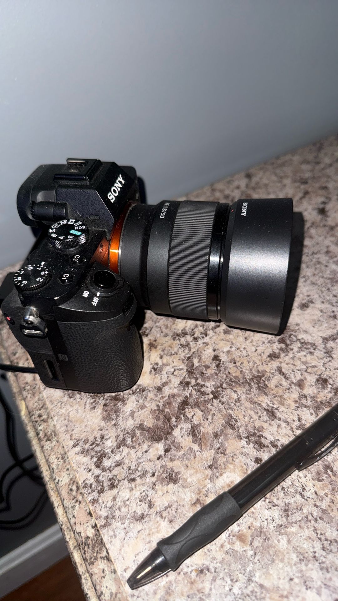 A7ii Sony With A 50mm Prime Lens And Externas NP BATTTERY ADAPRTER