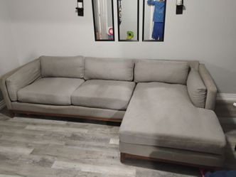 Couch for sale in good condition looks dirty from flash and lighting in room it's clean