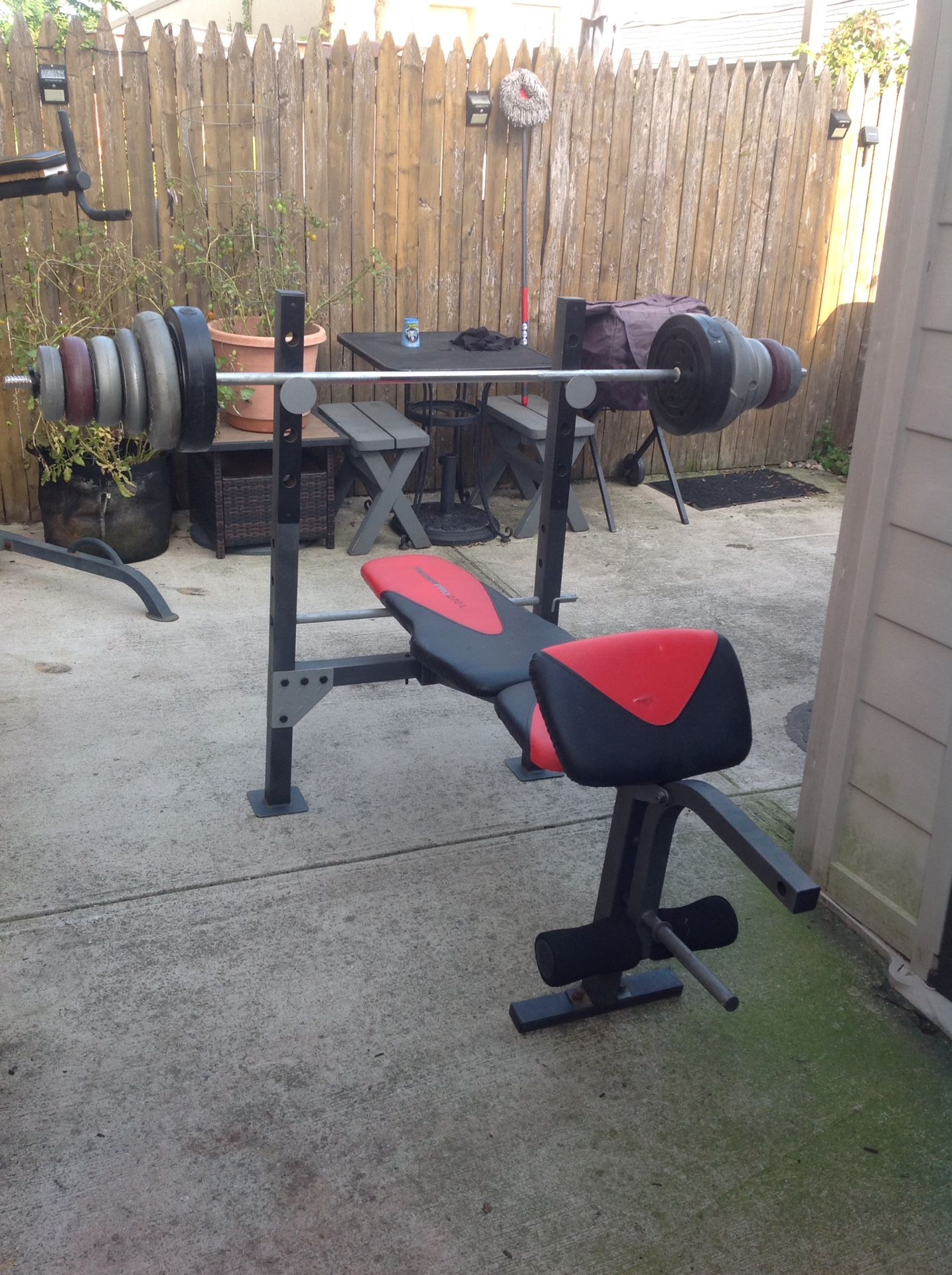 Workout bench , 20 lbs 5 ft bench bar ,95.6 lbs of weights