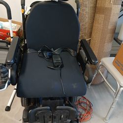2022 Quantum electric wheelchair.  Included is a silver spring carrier  and door ramp.