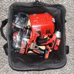 milwaukee drills with accessories & bag.