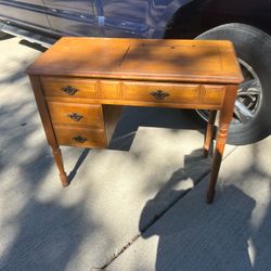 Vintage wooden sewing cabinet desk 30”T 36”L 18” D in warm honey finish & classic brass-tone pulls
