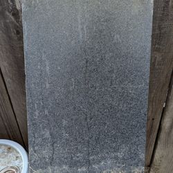 Slab of gray black granite