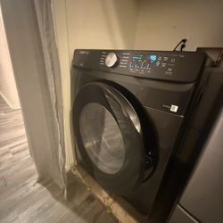 Very good condition!! Samsung - 4.5 Cu. Ft. High Efficiency Stackable Smart Front Load washer.