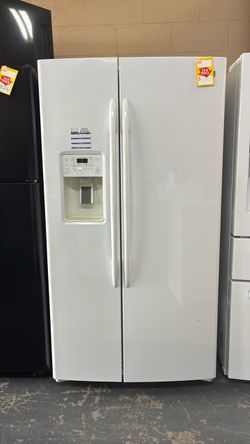 Like new GE side by side refrigerator