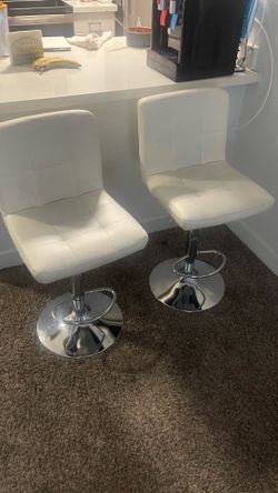 White swivel chairs