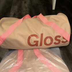 GLOSSIER DUFFLE BAG