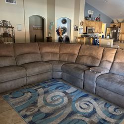 Brown Sectional Couch 2 power recliners w/ battery packs. 1 manual recliner